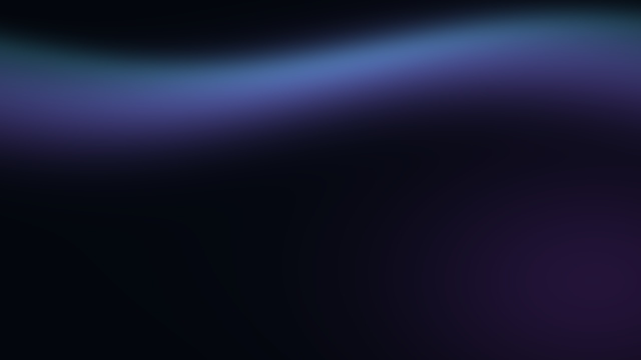 Teal and violet curtains flow across a midnight sky.