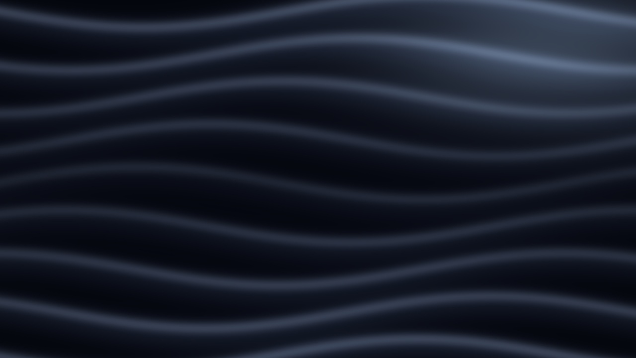 Satin-like metallic folds ripple around an open centre.